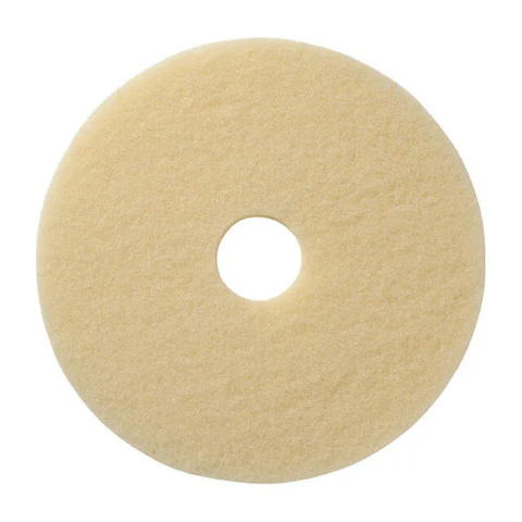 A round buffing pad on a white background.