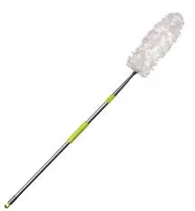 A white mop with a green handle.